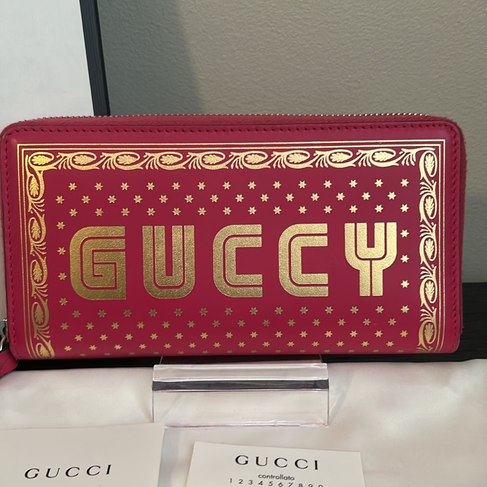 Gucci “GUCCY” Sega Long Zippy Stars Wallet Pink